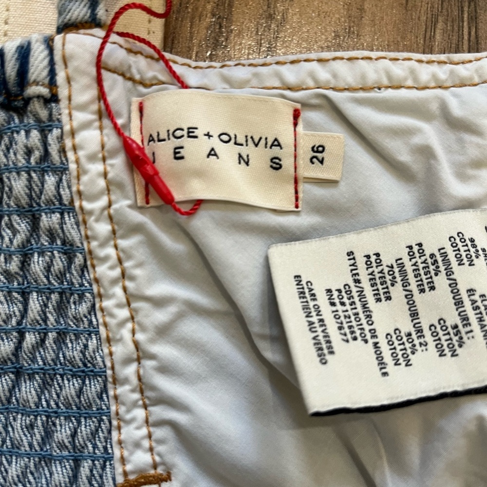 ALICE + OLIVIA Jeans Sleeveless Belted Denim Jumpsuit in Fools Paradise 26 - Picture 4 of 14